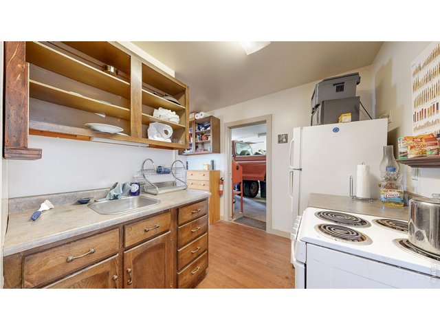 Property Photo 24 Shop/Office: 2 Car Garage with office, bathroom, kitchenette