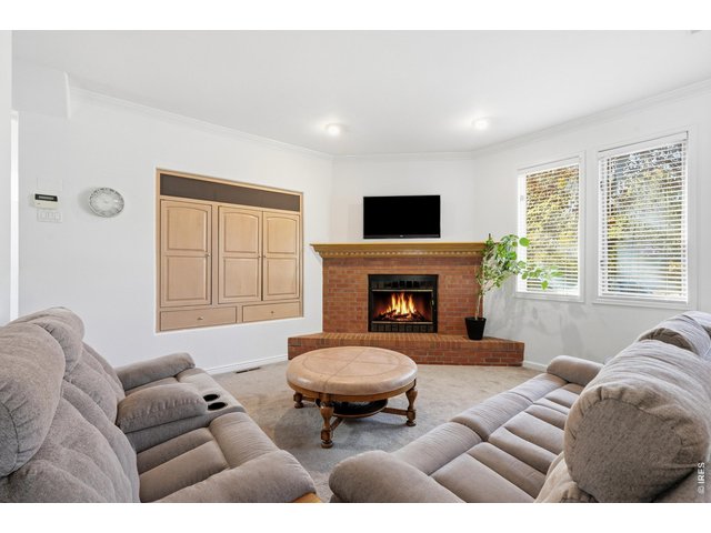 Property Photo 7 Great space to socialize or get cozy around the fire. 