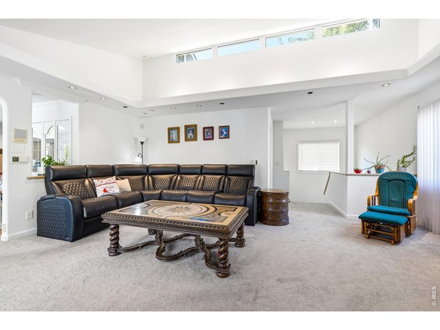 Property Photo 10 Great Room with vaulted ceilings, french doors to the backyard and the many windows bring in tons of light.