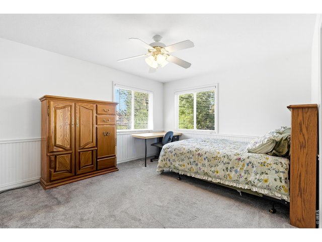 Property Photo 19 2nd bedroom on upper level west-facing.
