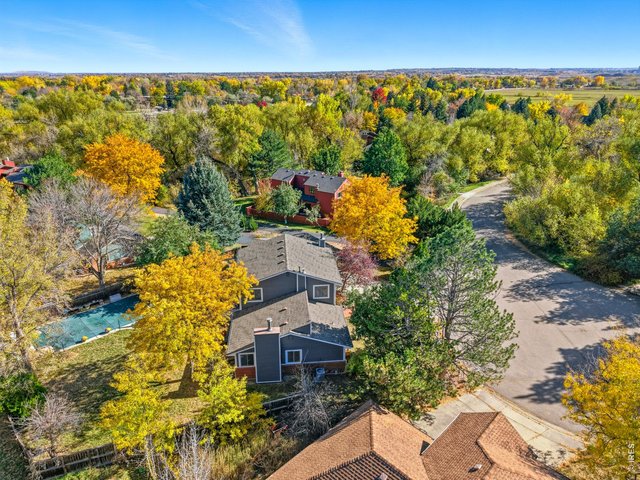 Property Photo 2 Welcome home to 4584 Robinson Place! Located on a quiet cul-de-sac with a big backyard + pool, and trails right out your door. 