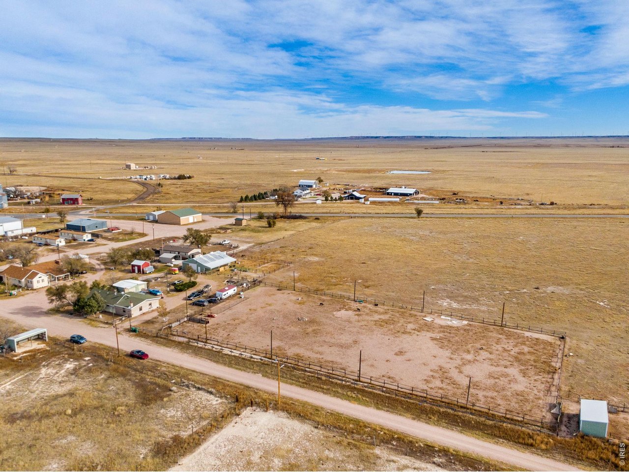 Arena is approximately 150'x300' with a calf roping chute and poles to add lighting.