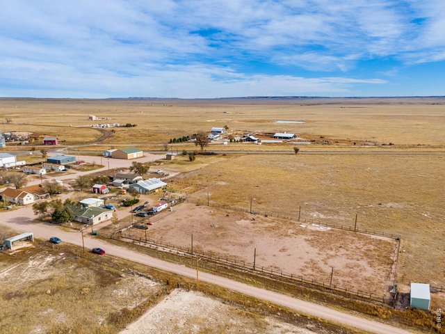 Property Photo 4 Arena is approximately 150'x300' with a calf roping chute and poles to add lighting.