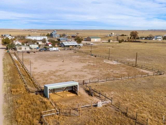 Property Photo 38 Nice loafing shed at the end of the arena with two pen areas