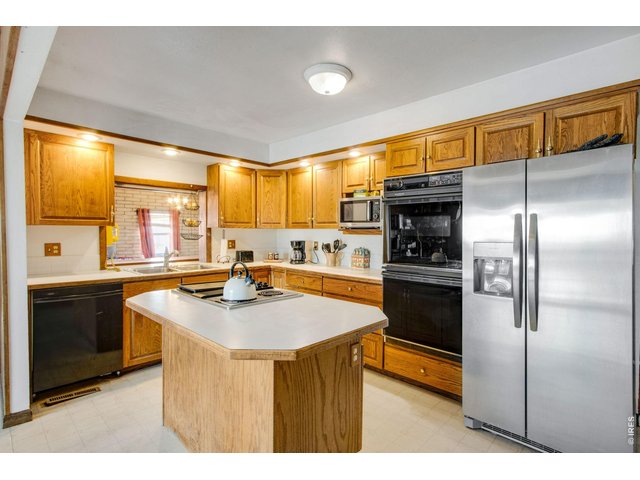 Property Photo 18 Open 16'x10' kitchen, all appliances included.