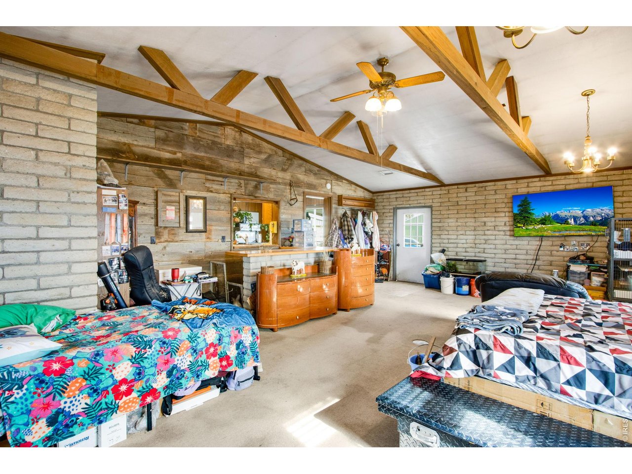 Wood plank wall behind wet bar. 3/4 bath is to you left out of view.