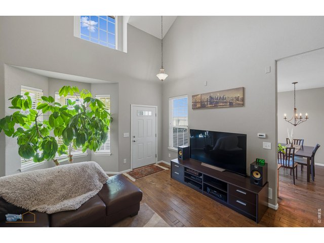 Property Photo 7 Living Room Has High Glass
