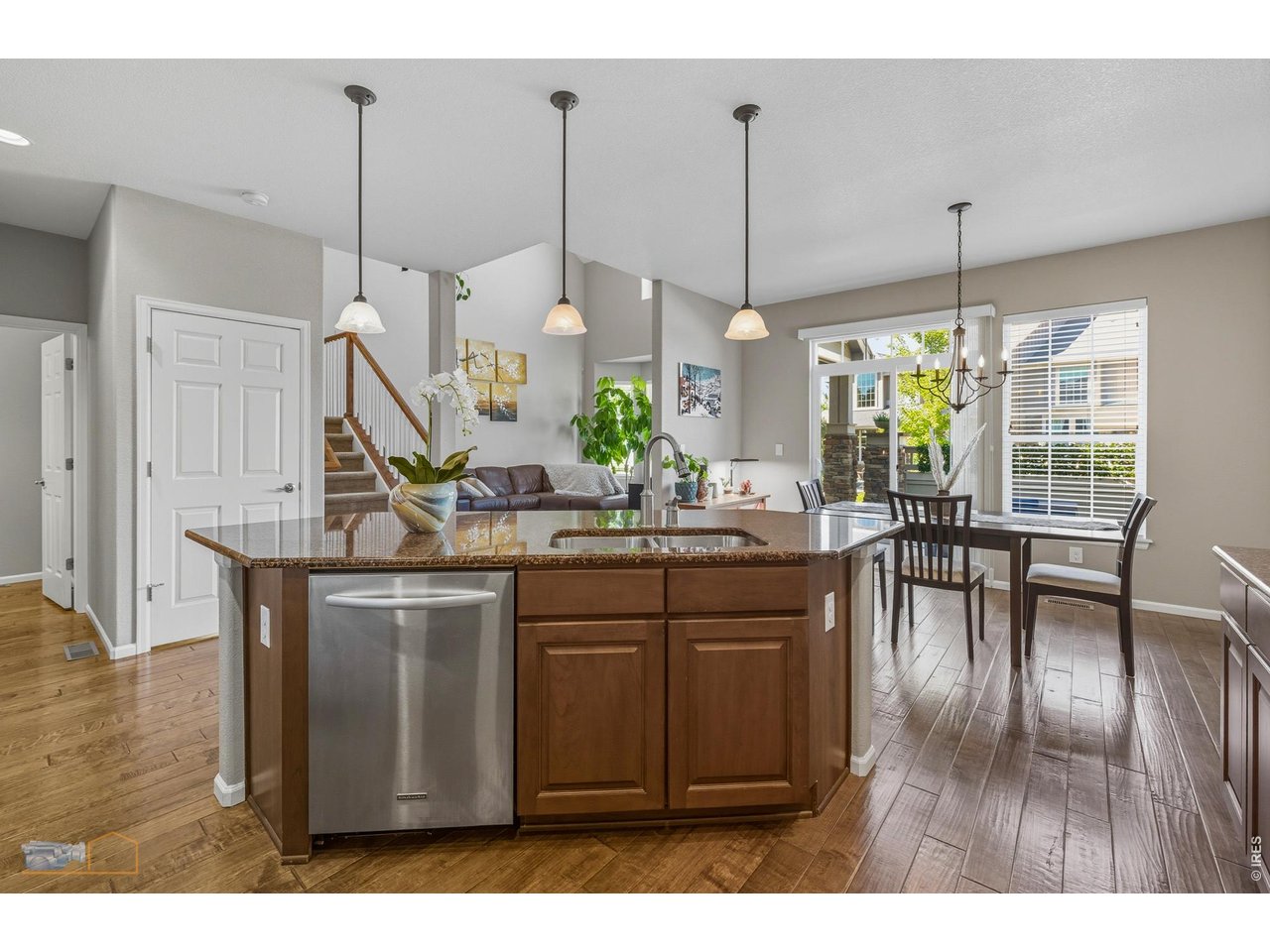 Open Great Room Concept. Kitchen Opens To Living Room And Dining Room
