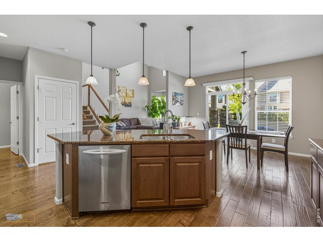 Property Photo 9 Open Great Room Concept. Kitchen Opens To Living Room And Dining Room