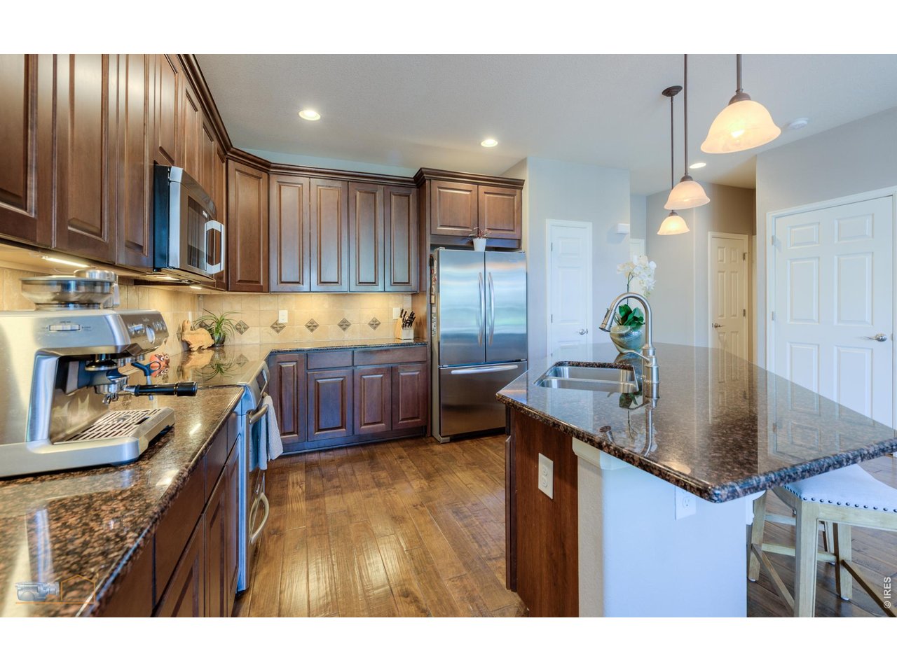 Kitchen Has Nice Wood Cabinets, Granite Countertops And Full Tile Backsplash