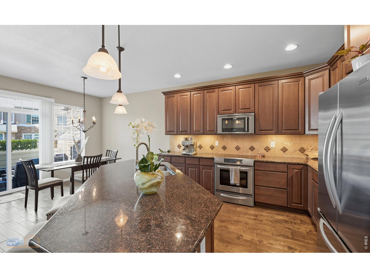 Kitchen Features Stainless Steel Appliances. KitchenAid Double Door Fridge, KitchenAid Electric Range/Oven, KitchenAid Dishwasher, Electrolux Microwave. SS Double Basin Sink