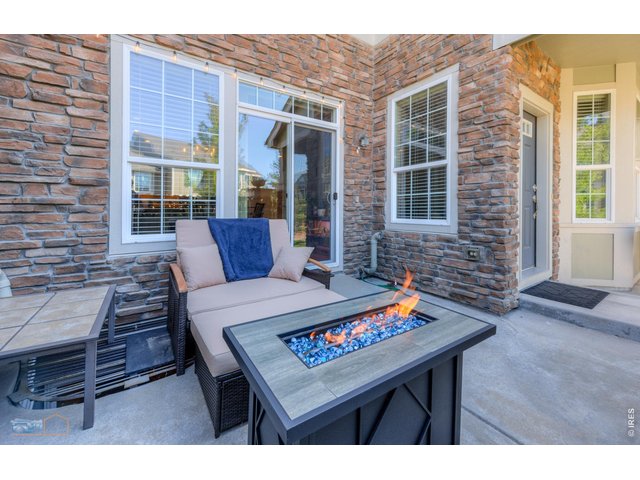 Property Photo 15 Large Front Patio For Relaxing, Entertaining And BBQ'ing