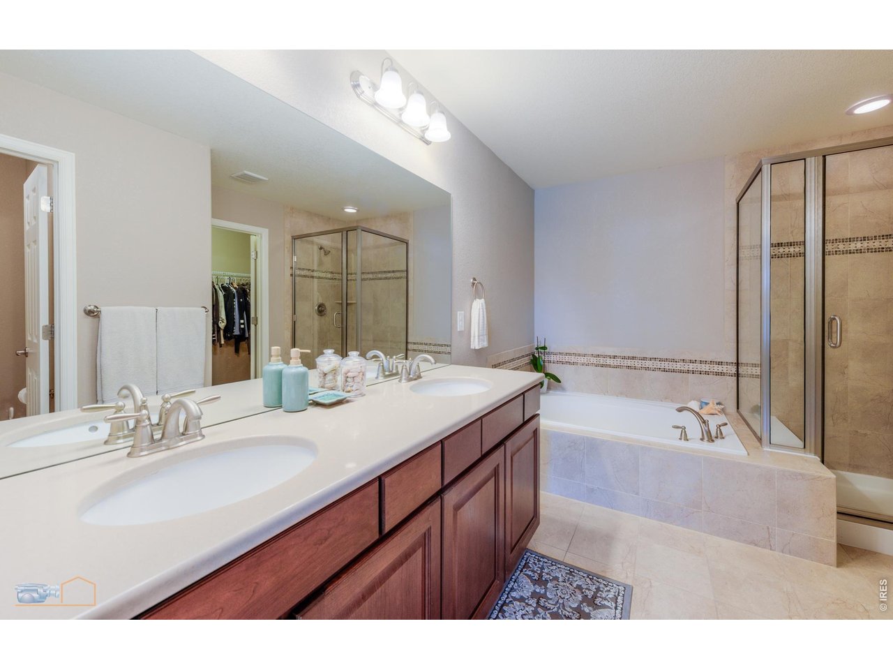 5 Piece Primary Bedroom Bath Features Solid Countertop, Tile Floor, Double Vanity, Soaking Tub, Separate Shower And Private Commode