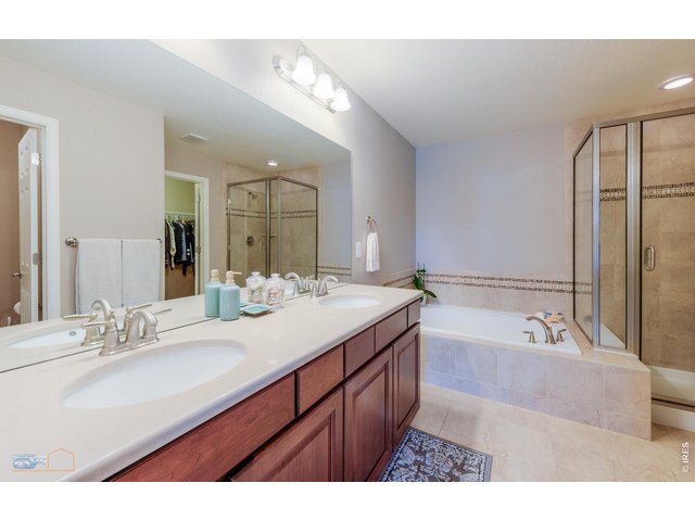 Property Photo 21 5 Piece Primary Bedroom Bath Features Solid Countertop, Tile Floor, Double Vanity, Soaking Tub, Separate Shower And Private Commode