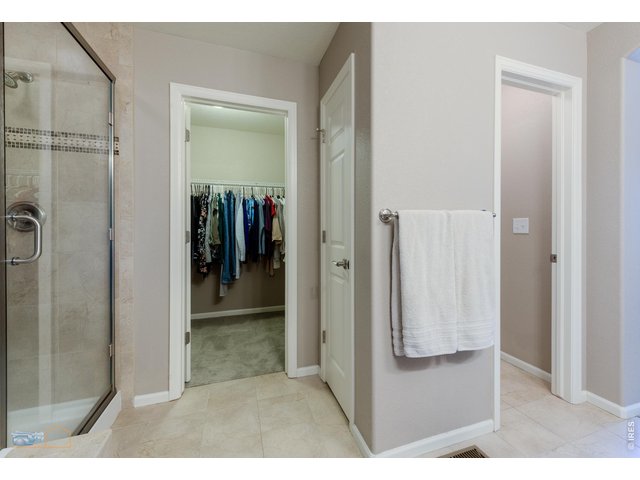 Property Photo 22 Primary Bedroom Features Two Clothes Closets