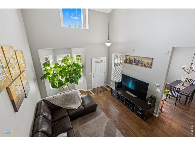 Property Photo 6 Wood Floors On Main Floor. Living Room, Dining Room And Kitchen