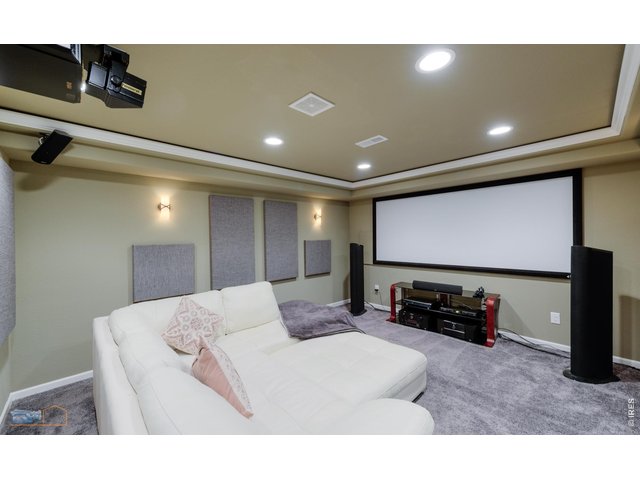 Property Photo 27 Beautiful Finished Basement Features A Theater Room With Surround Sound And Coffered Ceiling