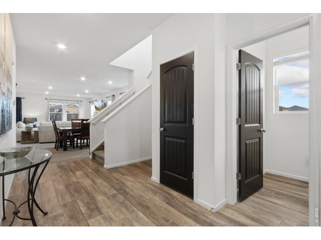 Property Photo 5 Entry way with powder bath and coat closet