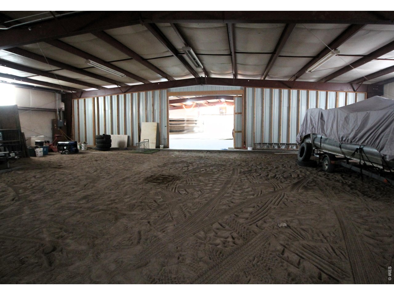 Property Photo 42 South half of shop looking to sliding door.
