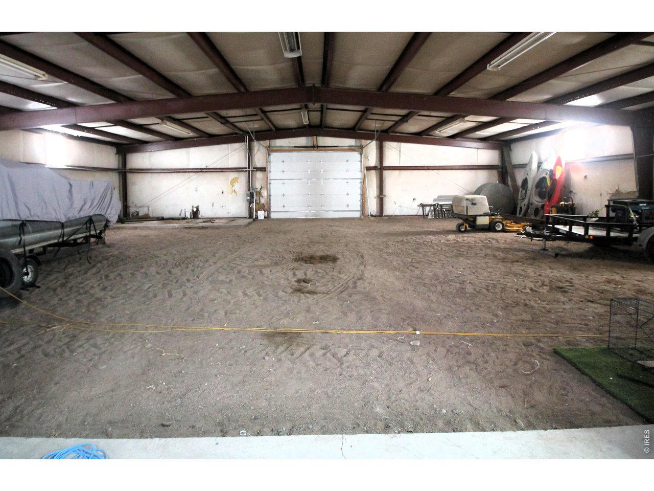 Property Photo 41 South half of shop insulated, has power, but no concrete floor.