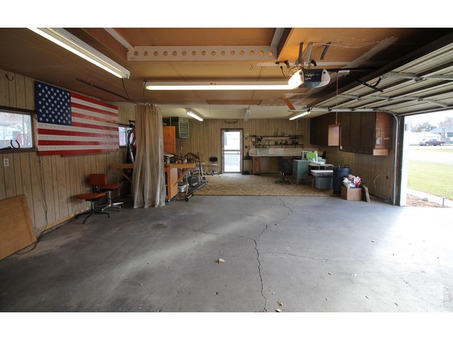 Property Photo 30 Heated Garage with workshop area!
