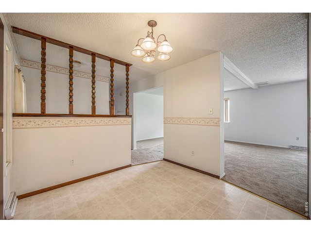 Property Photo 3 Entry & dining room