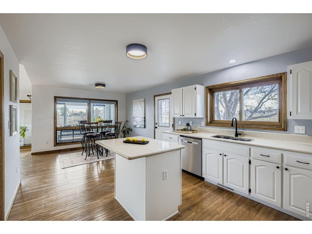 Property Photo 9 Kitchen, Eat-In Dining Room, Enclosed Patio - Main Floor