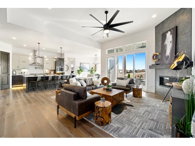 Property Photo 9 Beautiful Linear Gas Fireplace with Tile to Ceiling
