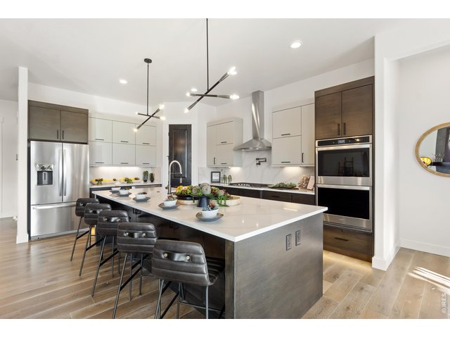 Property Photo 12 Upgraded Gourmet Kitchen with Custom Cabinets by Tharp