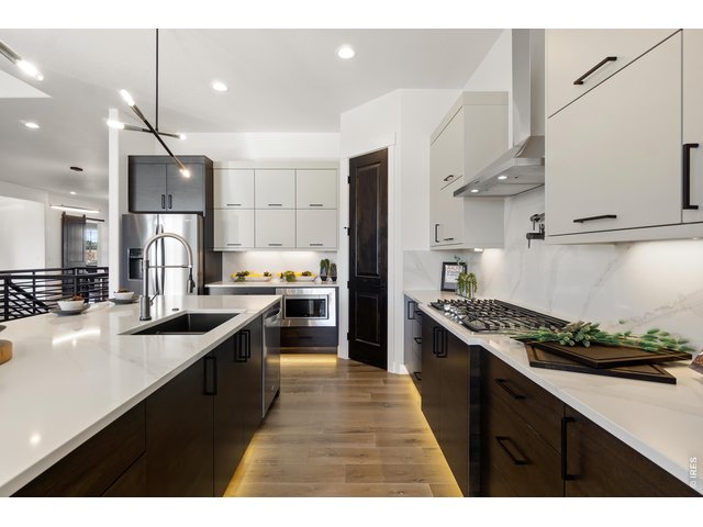 Property Photo 13 Slab Quartz Counters, Stainless Steel Appliances