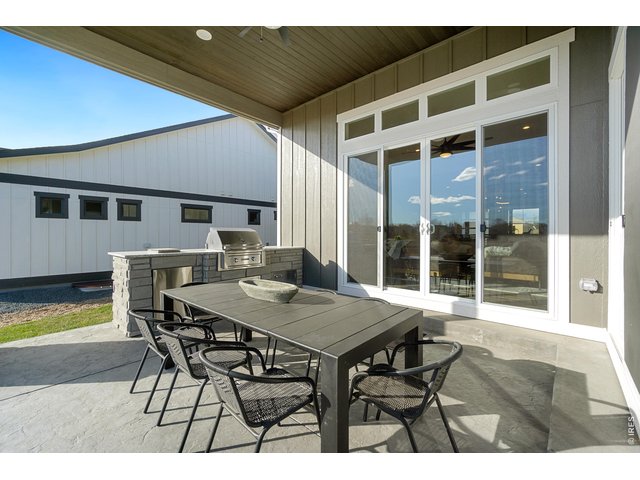 Property Photo 33 Covered Back Patio with Outdoor Kitchen! 
