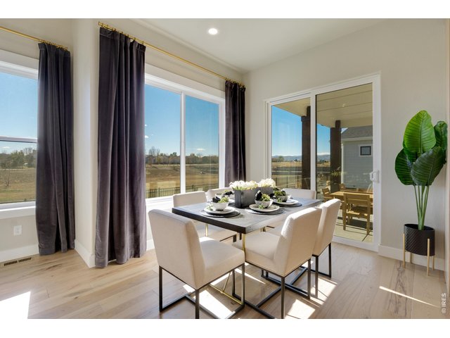 Property Photo 14 Dining Area off Kitchen with Access to Covered Patio