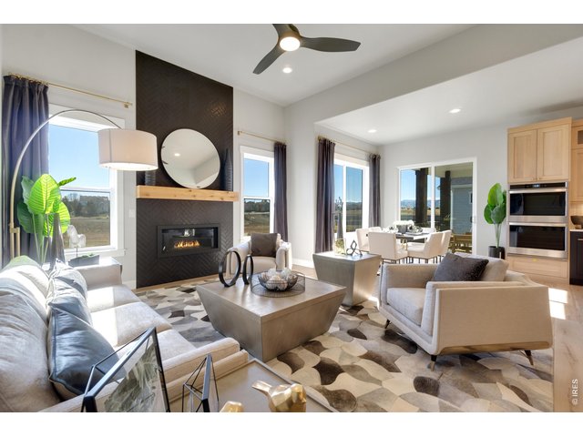 Property Photo 9 Relax by the Gas Fireplace with Tile to Ceiling!