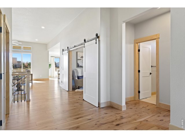 Property Photo 4 Beautiful Entry with Engineered Hardwood Flooring!