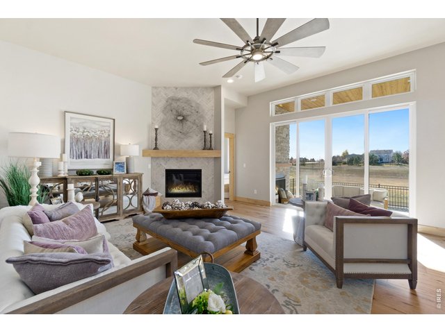 Property Photo 9 Upgraded Transom Patio Door opening to the Large Covered Patio! 