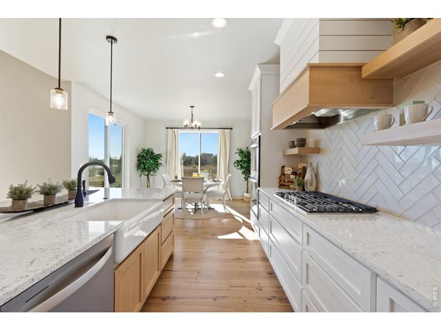 Property Photo 13 Gas Range with Shiplap Hood