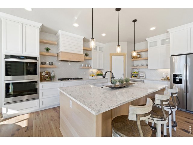 Property Photo 12 Walk-in Pantry with Stainless Steel appliances
