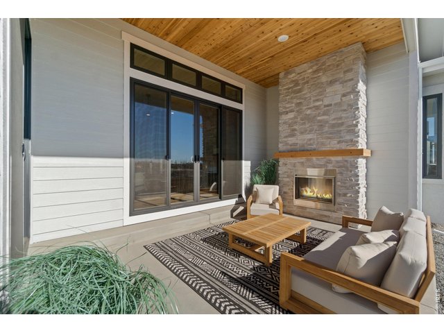 Property Photo 32 Large Covered Patio with Outdoor Fireplace! 