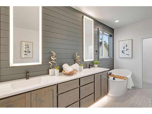 Property Photo 25 Dual Sinks and Lighted Mirrors