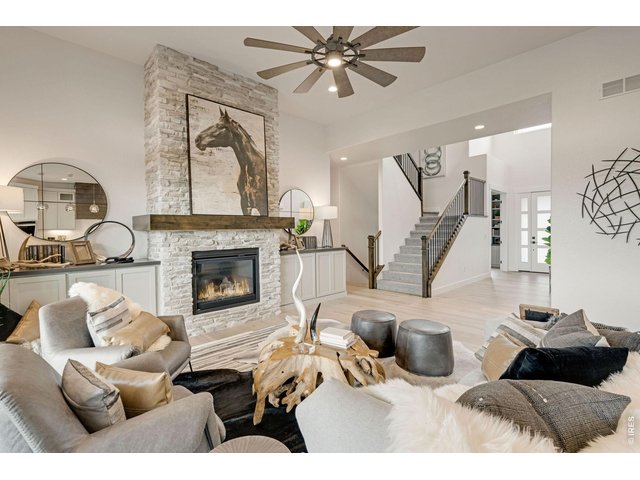 Property Photo 9 Gas Fireplace with Stone to Ceiling