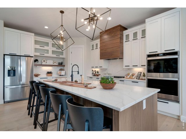 Property Photo 9 Upgraded Gourmet Kitchen with Stainless Steel Appliances