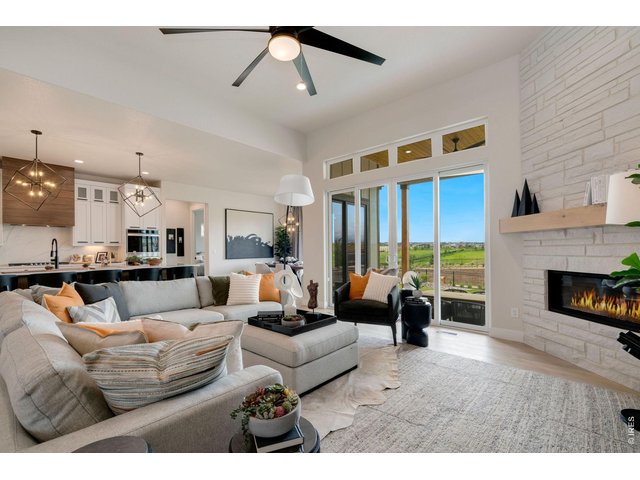 Property Photo 7 Great Room with 12ft Ceiling and Transom Slider