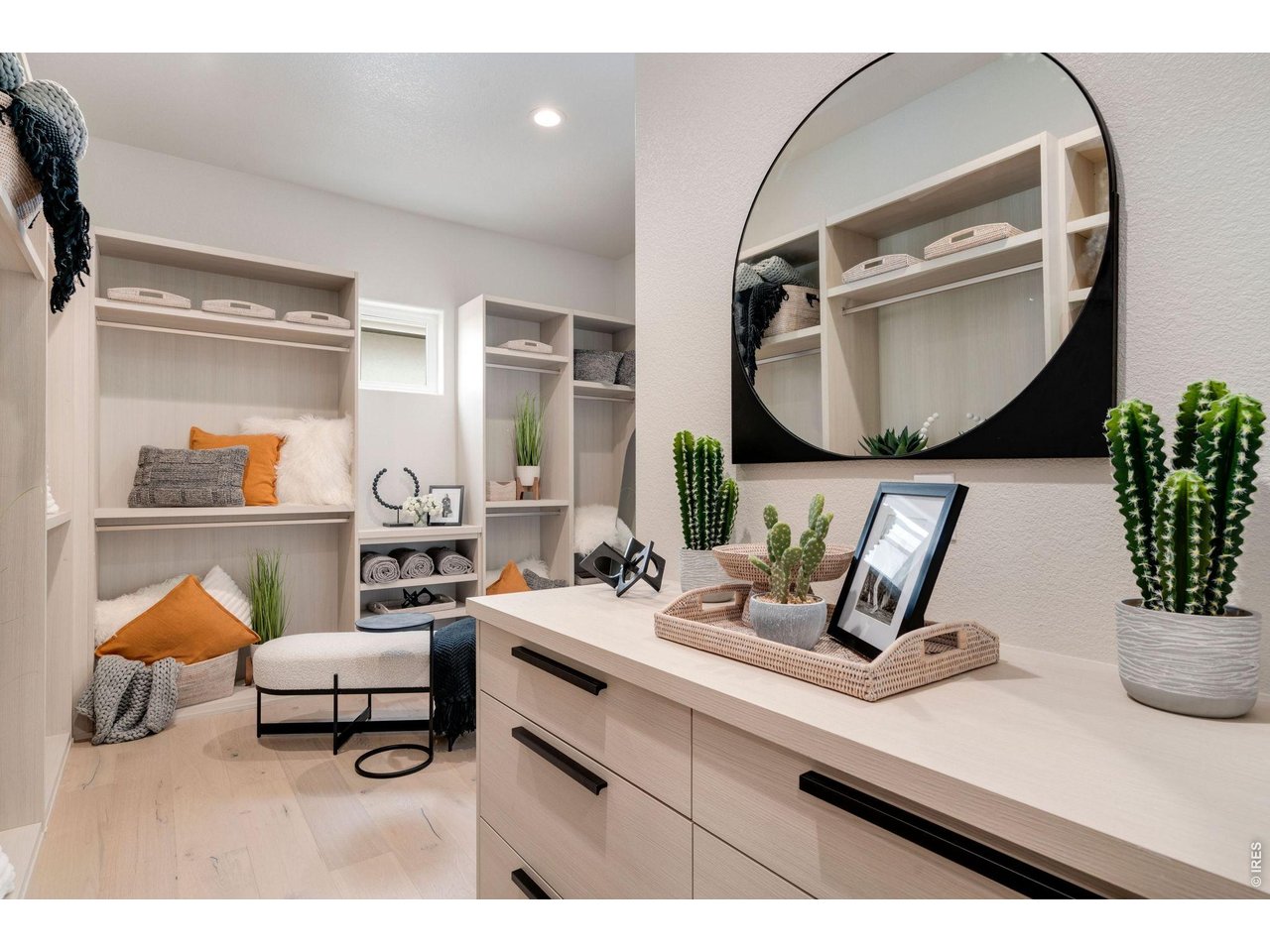 Amazing Custom Walk-in Closet with access to laundry room