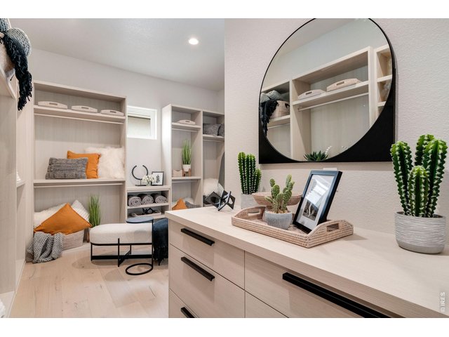 Property Photo 17 Amazing Custom Walk-in Closet with access to laundry room