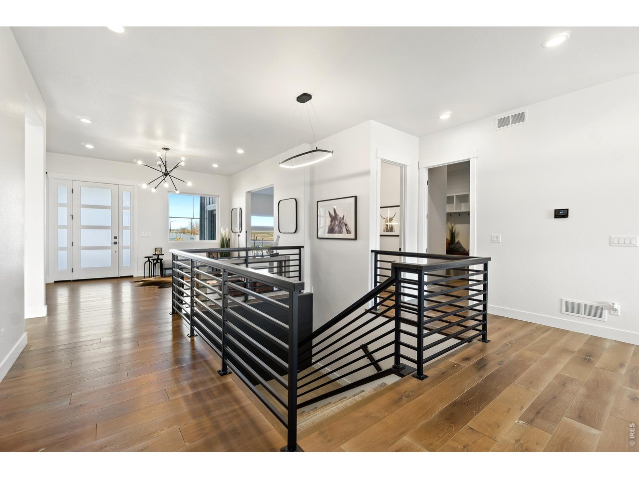 Welcoming Entryway with Engineered Hardwood Flooring