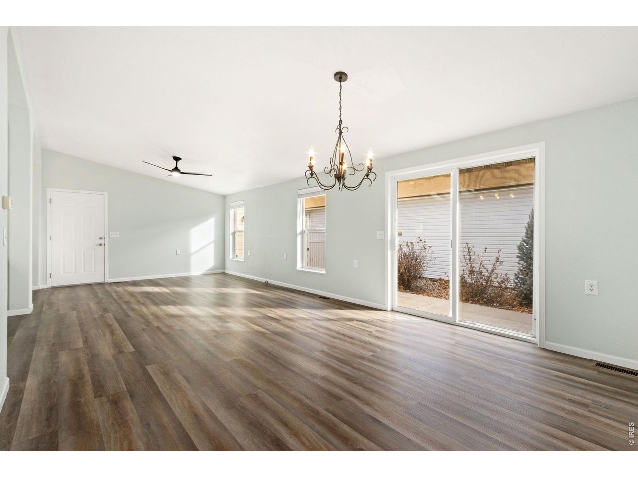 Living room and dining space flow into one another. 