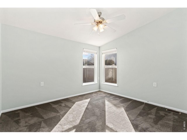 Property Photo 15 2nd bedroom with updated carpeting!