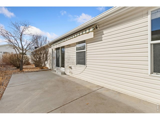 Property Photo 17 Retractable awning included. Private, fenced in backyard patio space. 