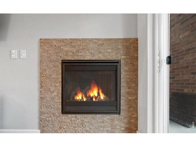 Property Photo 11 Cozy gas fireplace
