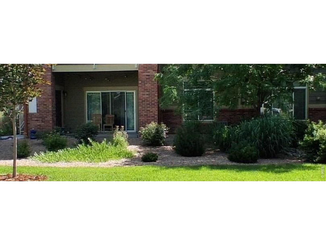 and a patio for enjoying the lovely landscaping.
